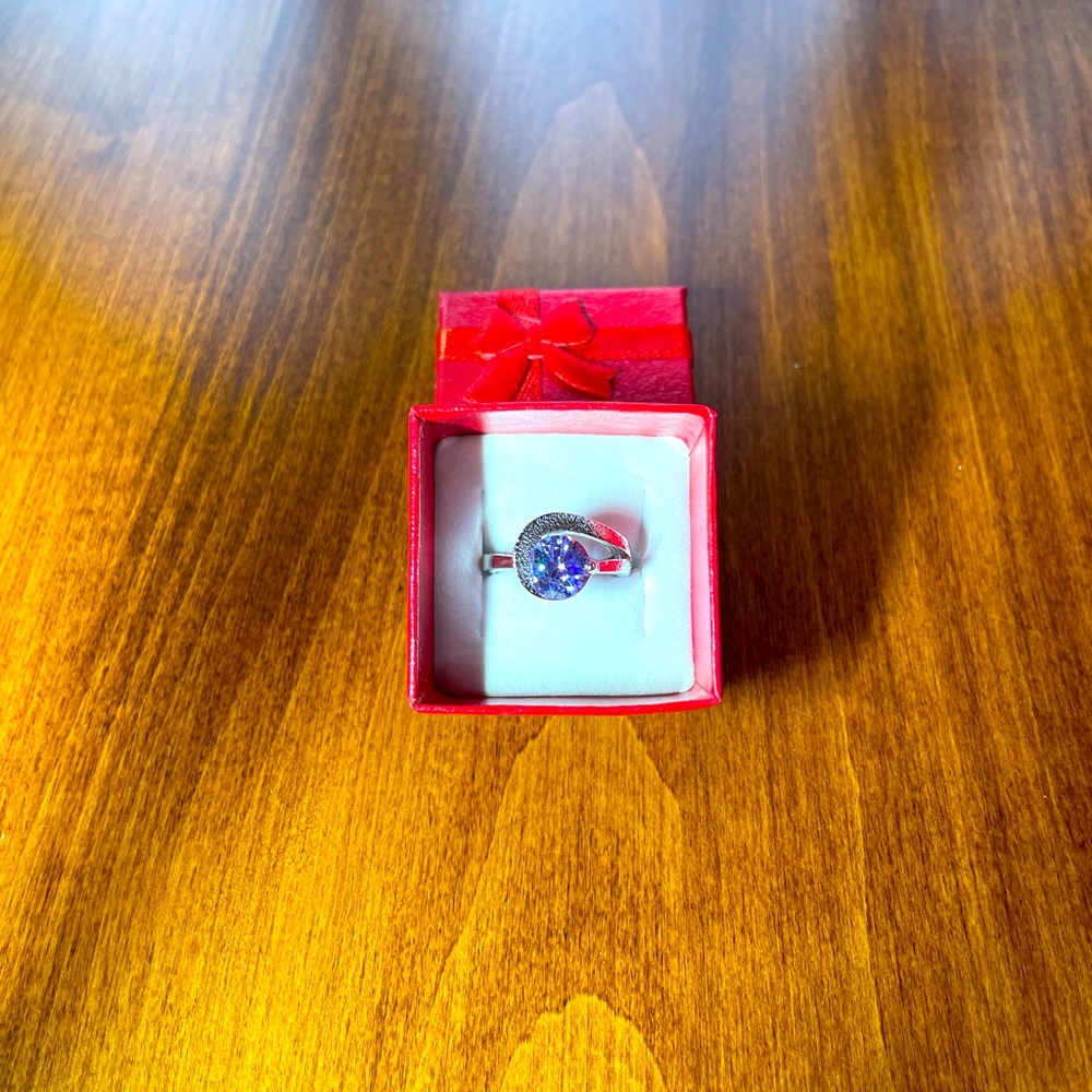 New Beautiful Light Purple Cubic Zirconia Ring, Size 6.